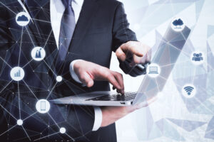 connected businessman using laptop with digital ne 2026 09 22 09 37 45 utc